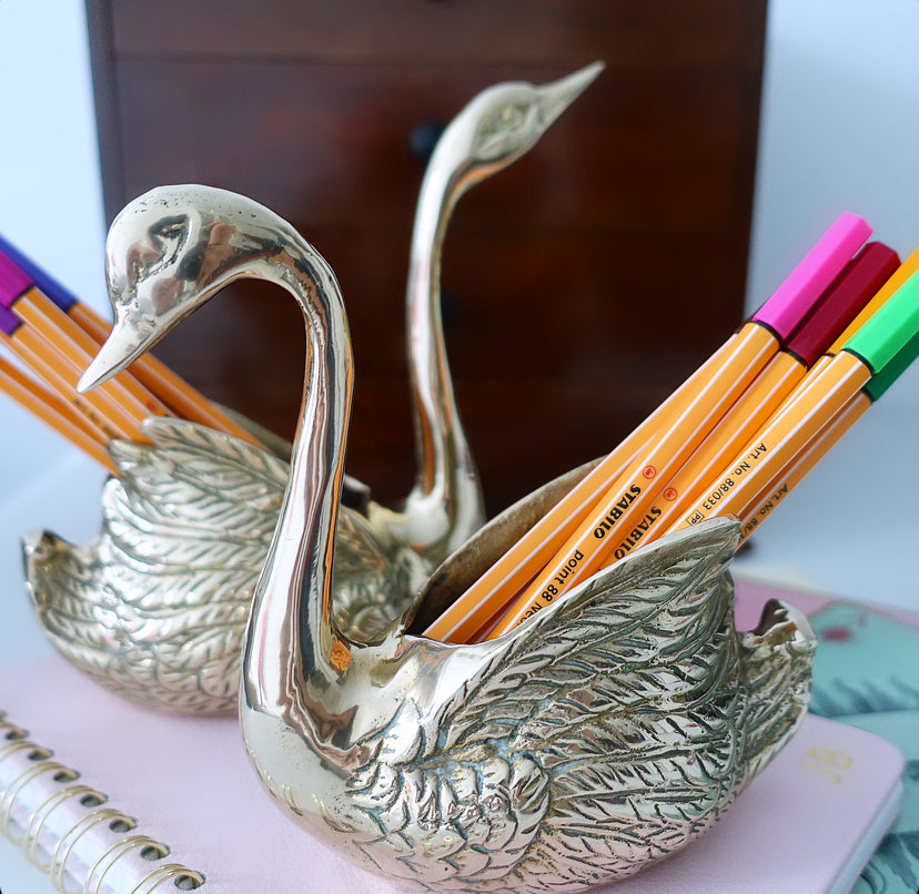 Pair of brass swans