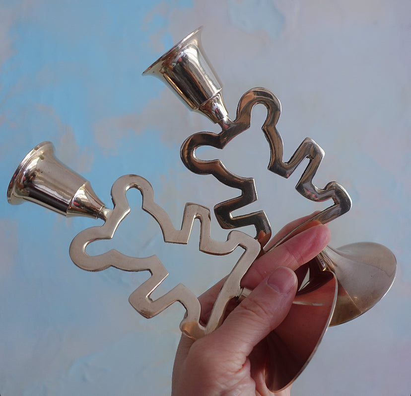 Pair of brass teddy bear candlesticks