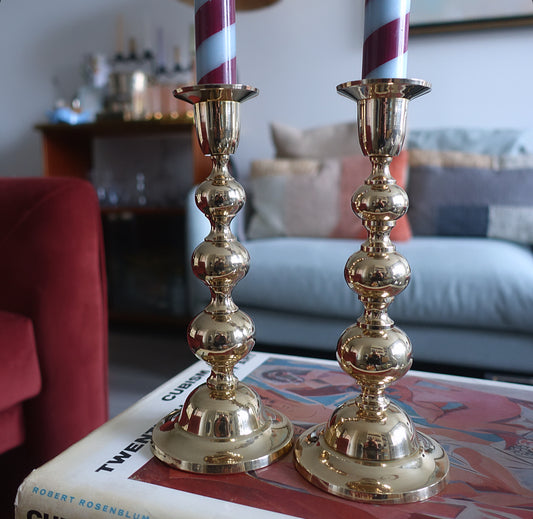 Pair of brass bobbin candle holders