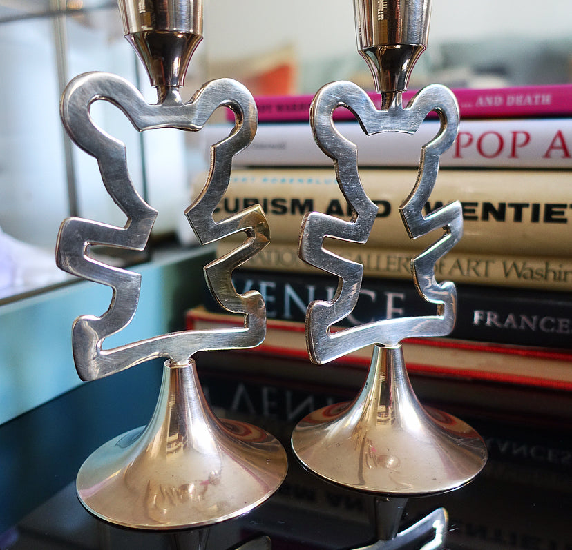 Pair of brass teddy bear candlesticks