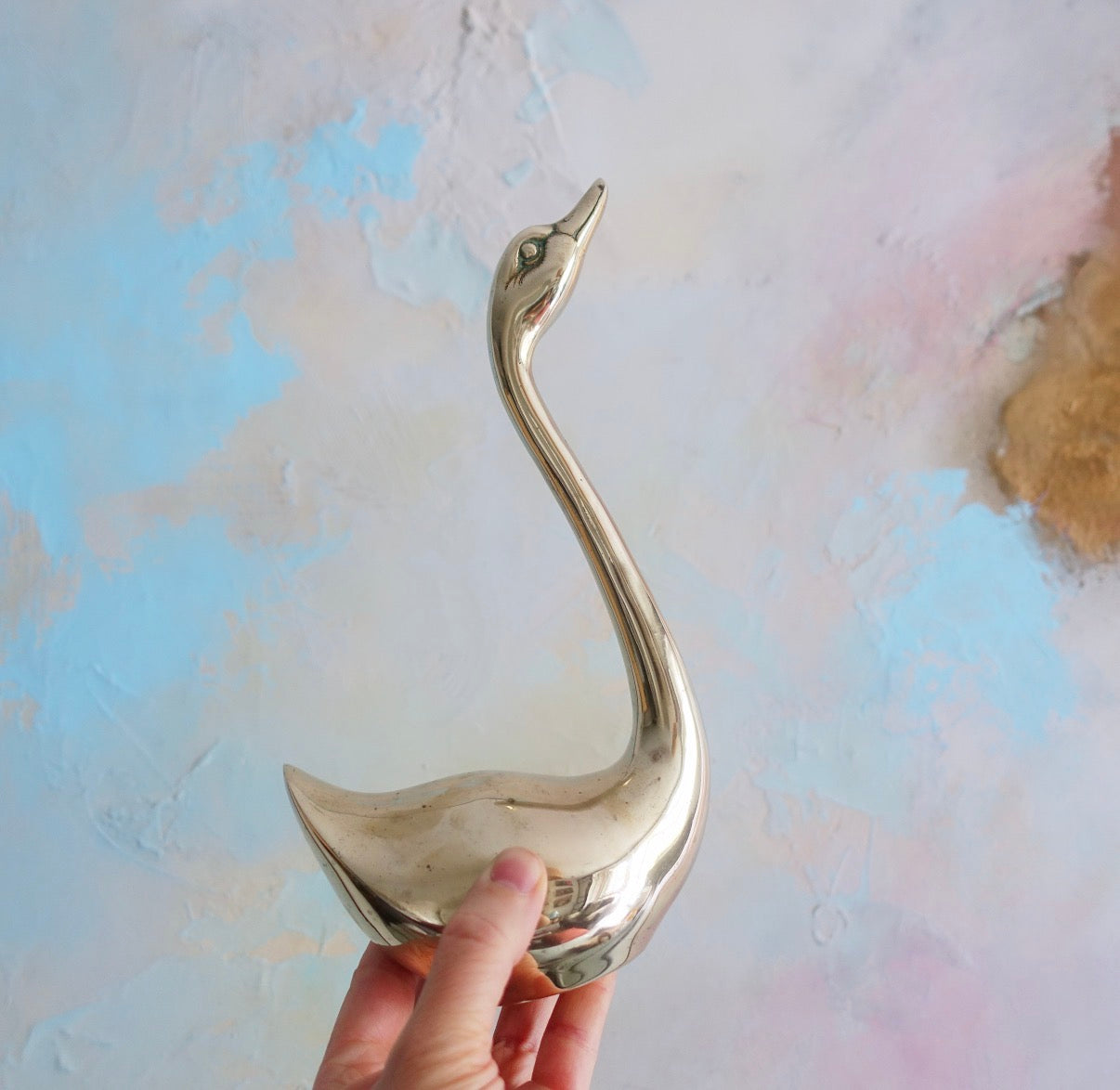 Pair of brass swans