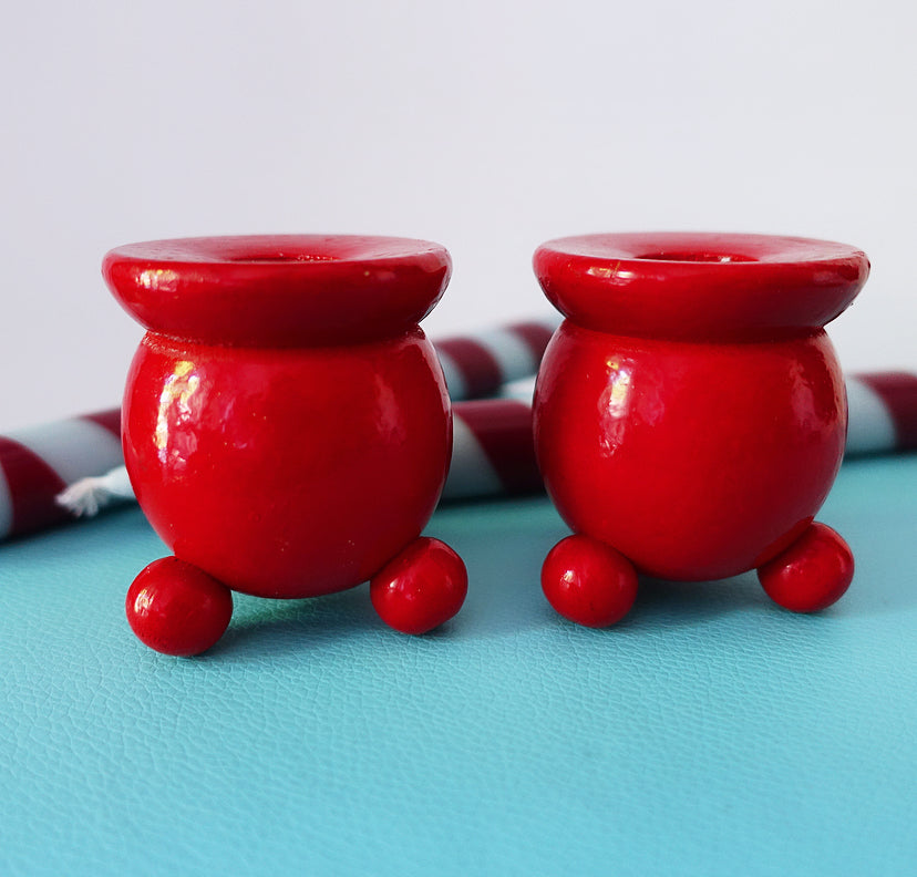 Pair of Swedish folk art candle holders