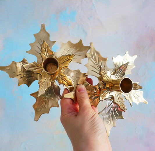Pair of brass holly candle holders