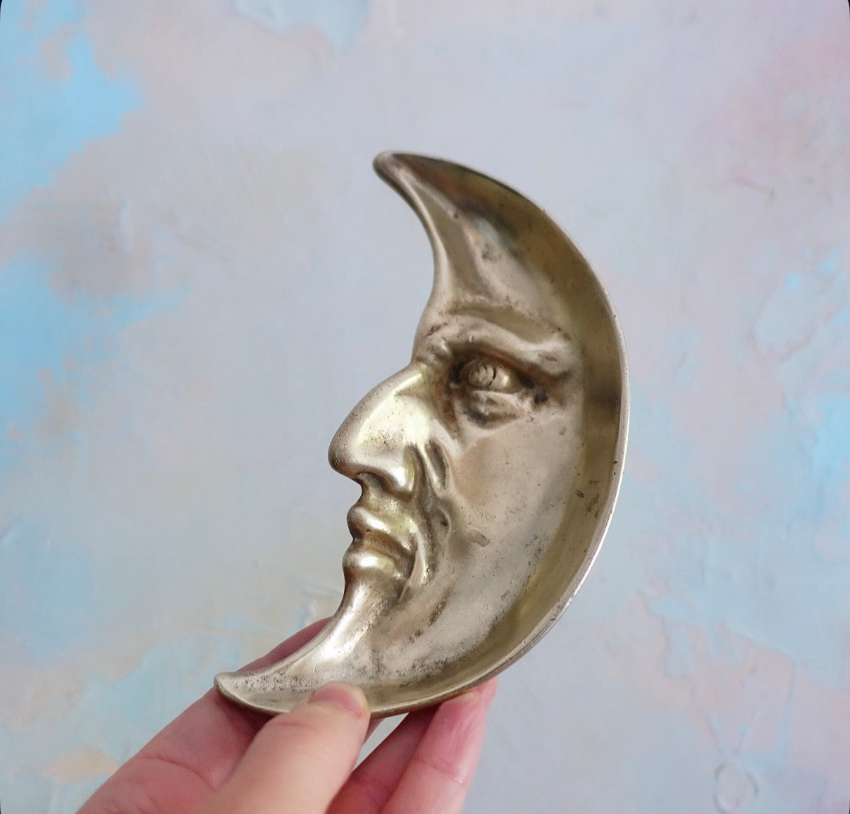 Brass man in the moon trinket dish