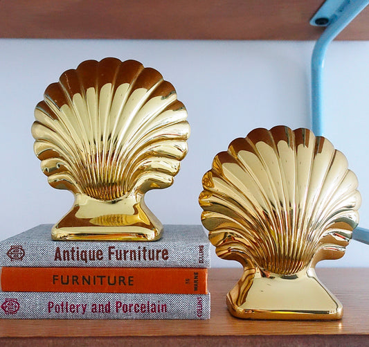 Pair of Hollywood Regency brass shell bookends