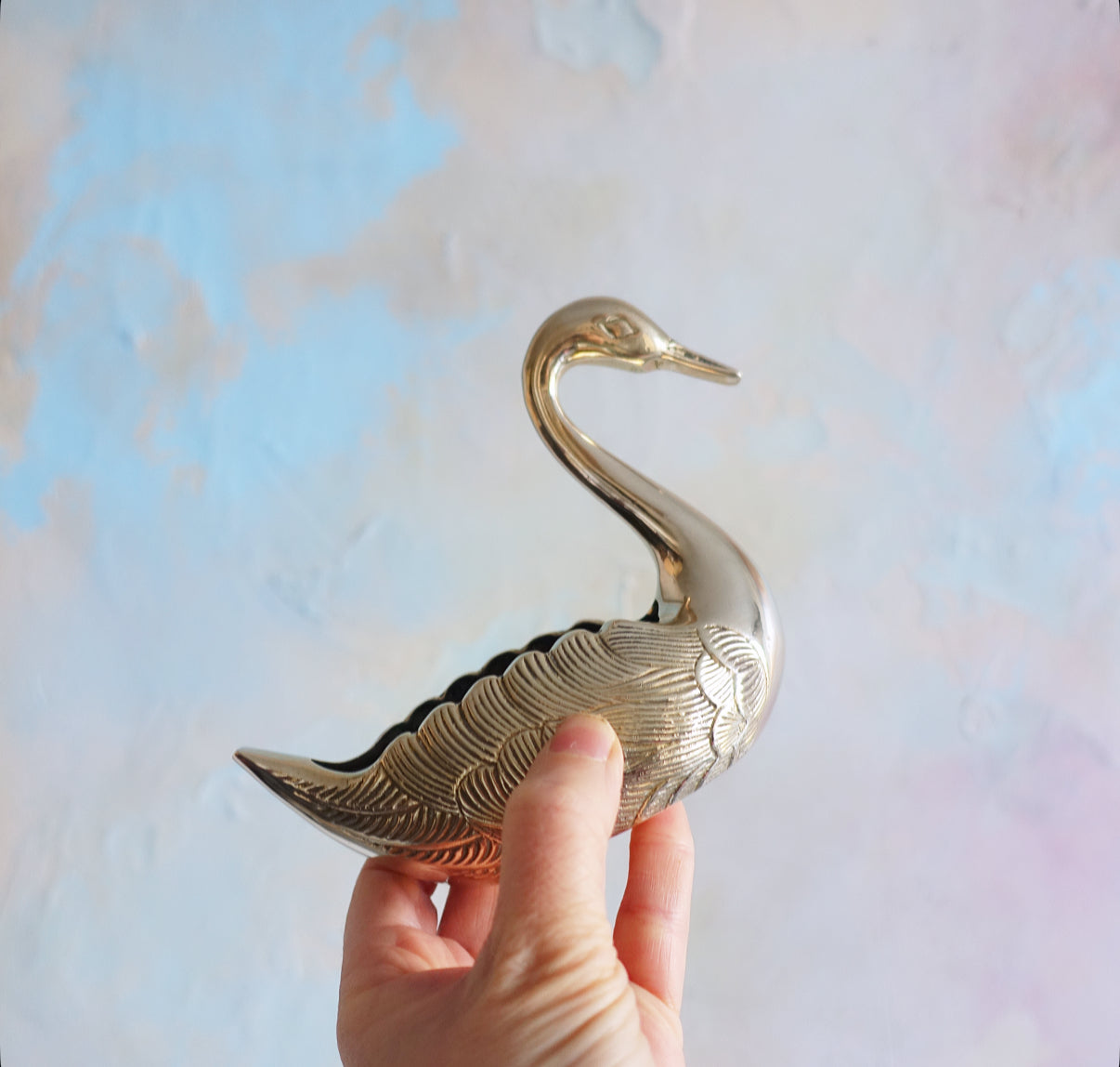 Pair of small brass swans