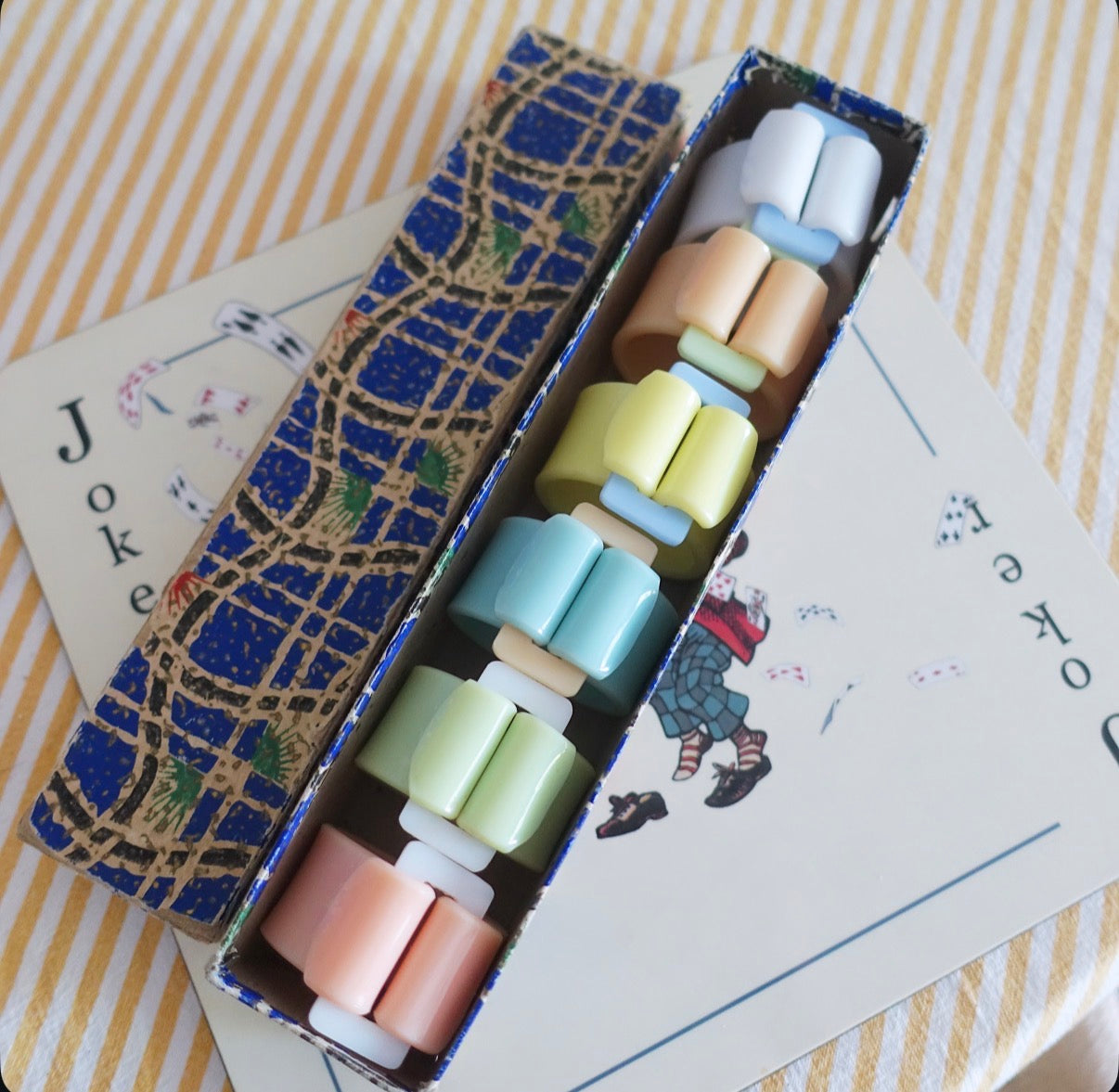 Set of six Pastel Bakelite buckle napkin rings