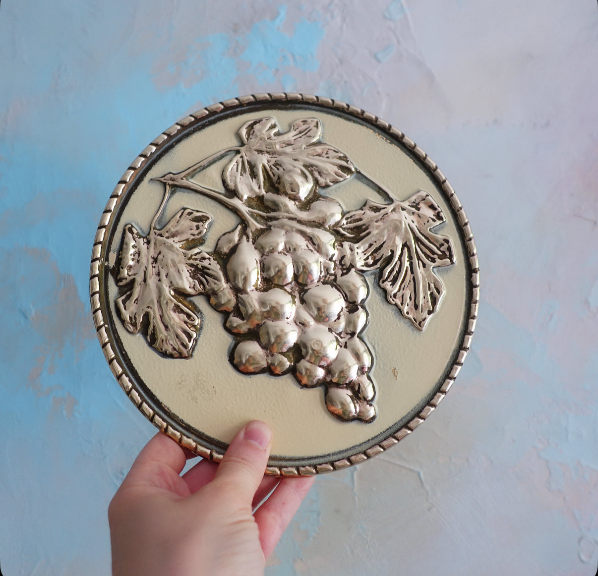 Set of four brass fruit wall plaques
