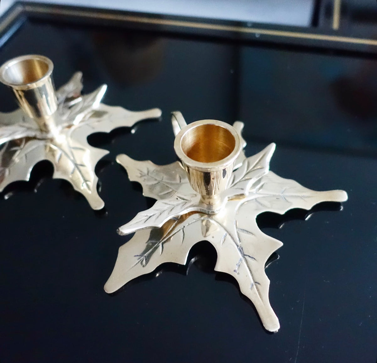 Pair of brass Holly candle holders