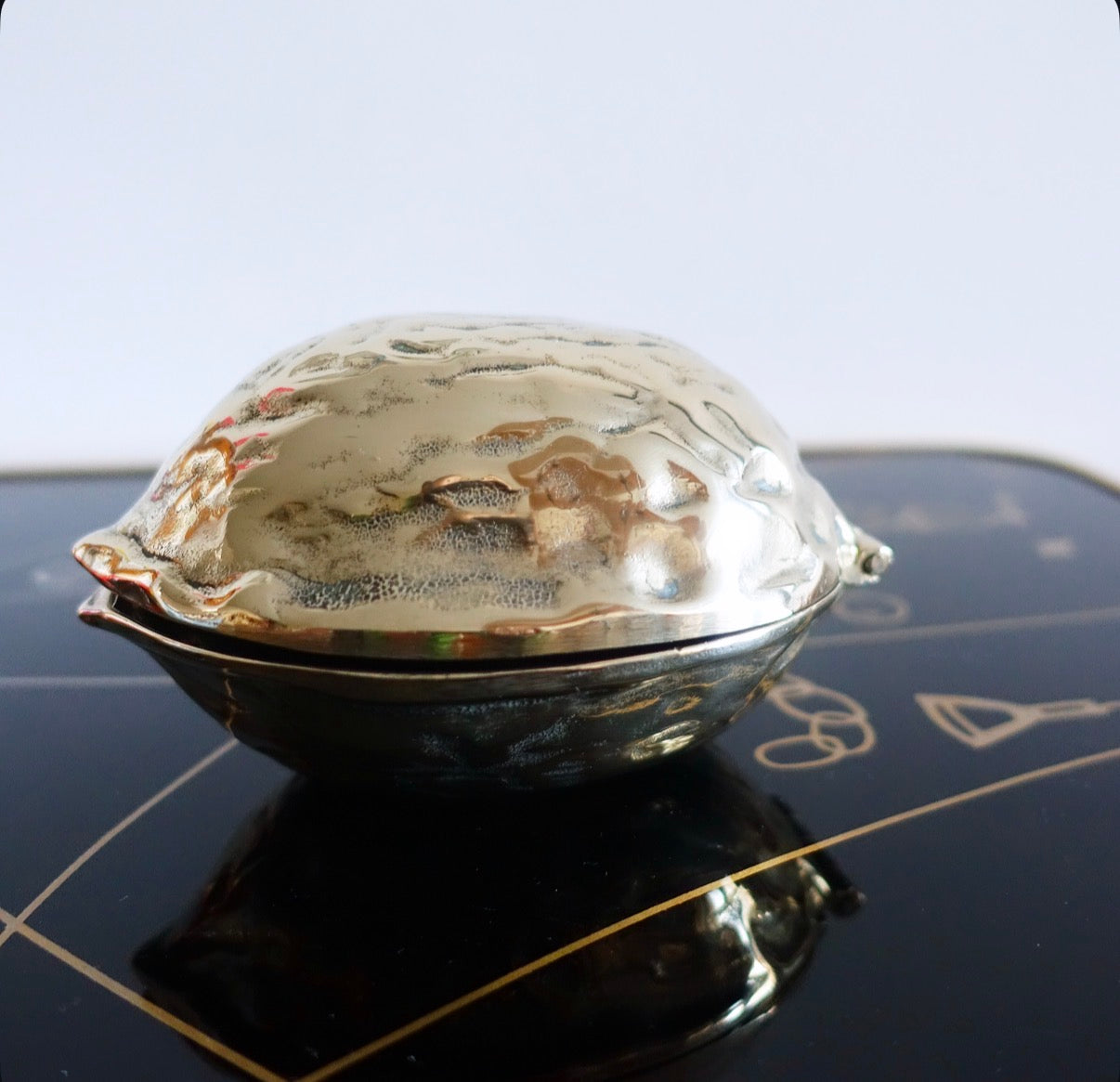 Brass walnut nutcracker