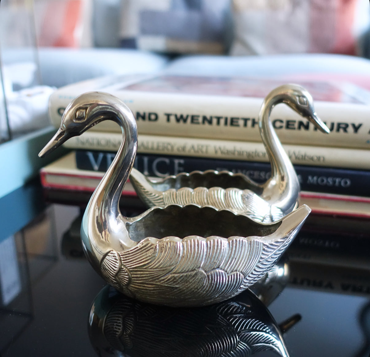 Pair of small brass swans