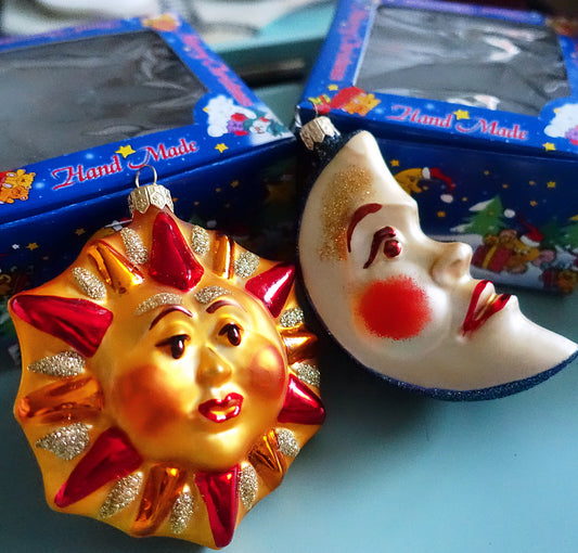 Pair of vintage celestial glass baubles