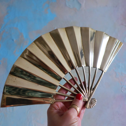 Hollywood Regency brass fan trivet