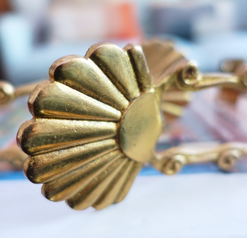 Pair of brass shell curtain tie-backs