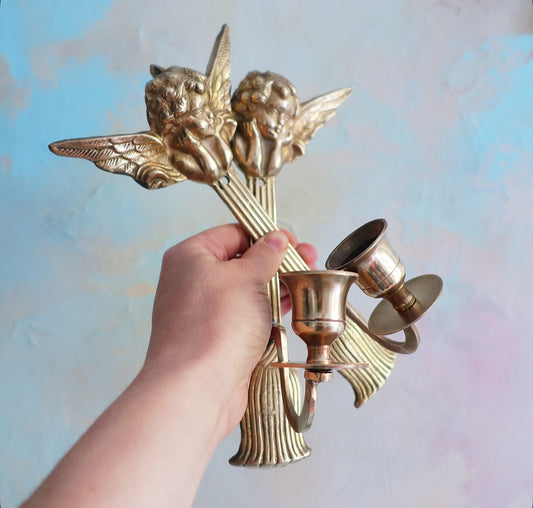 Brass cherub candle sconces