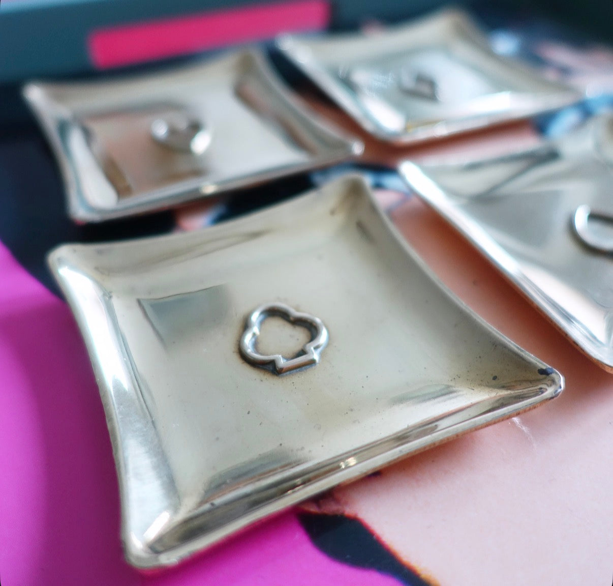 Set of four brass card suit trinket dishes