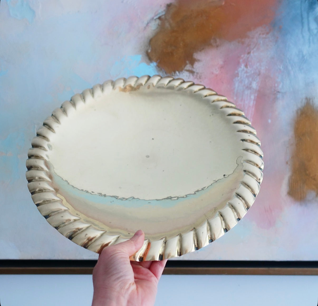 Large decorative brass bowl with ball feet