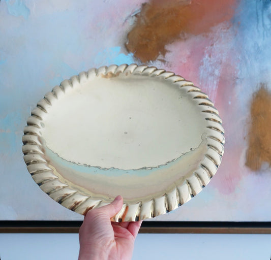 Large decorative brass bowl with ball feet
