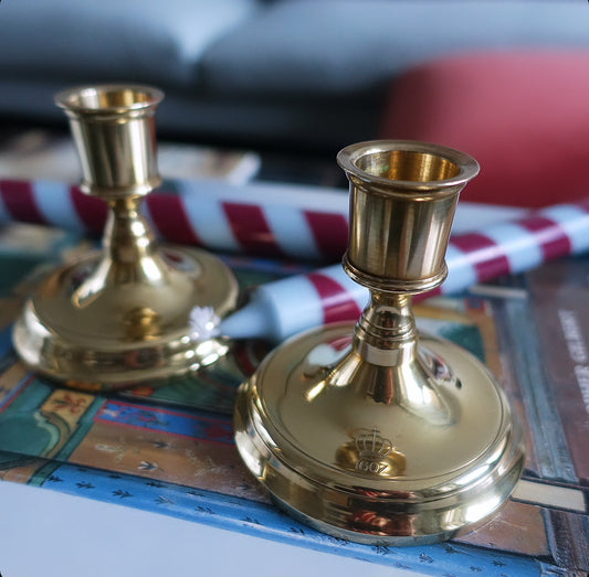 Pair of brass candle holders by Skultuna Sweden