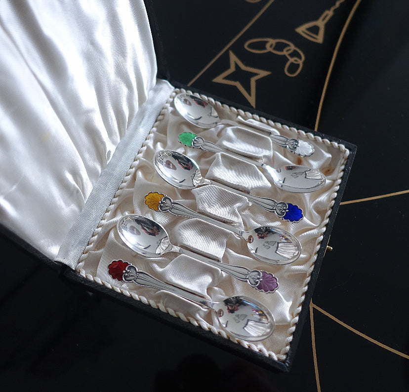 Cased set of six Danish Sterling silver & enamel shell spoons