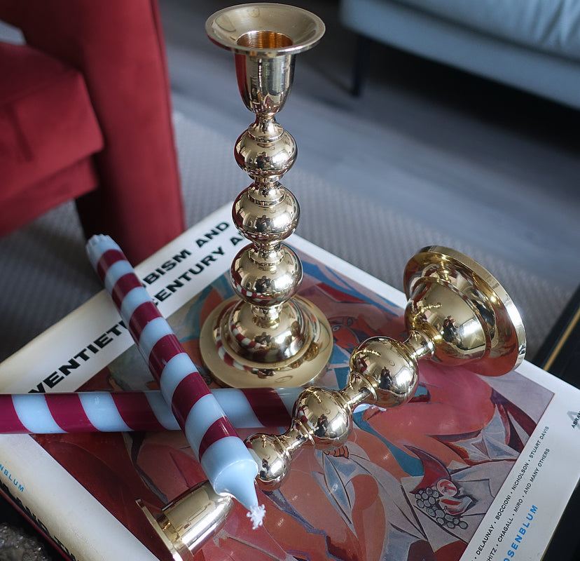 Pair of brass bobbin candle holders