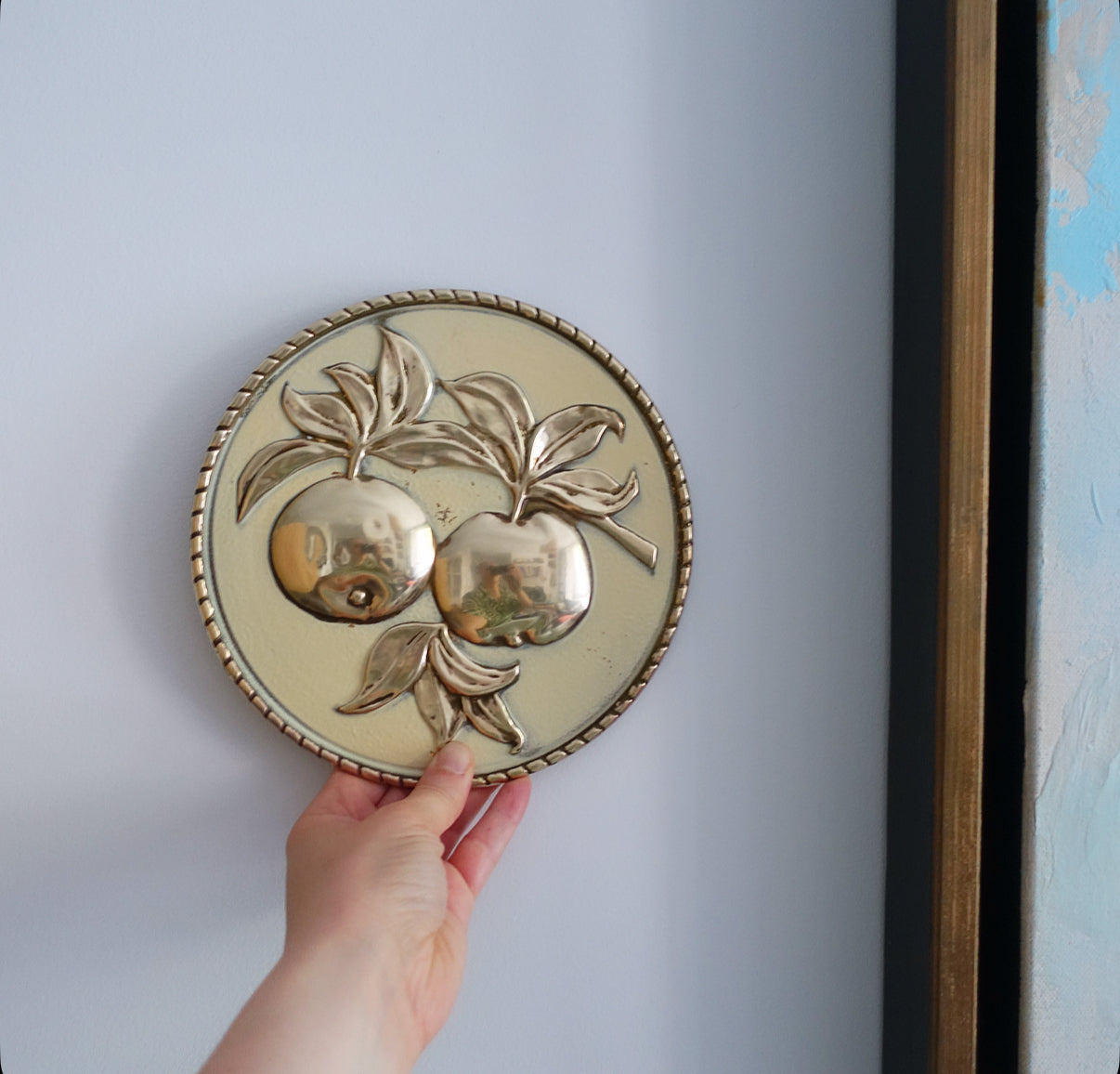 Set of four brass fruit wall plaques