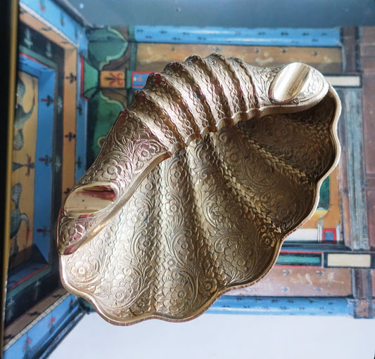 Engraved brass shell