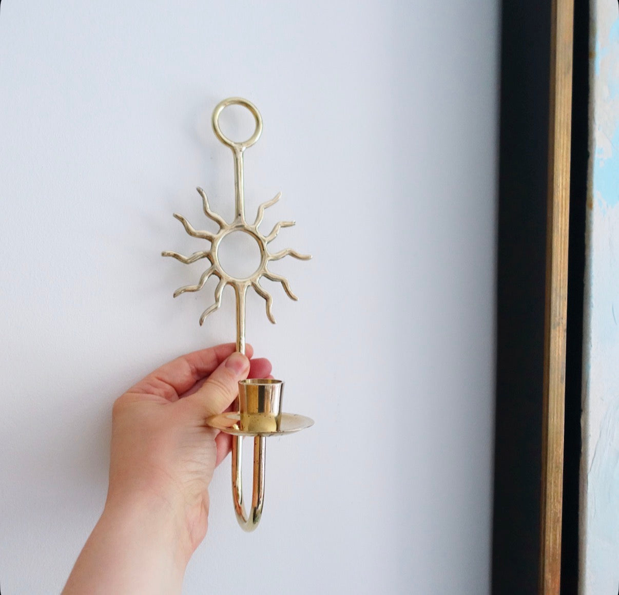 Pair of celestial brass sun candle sconces