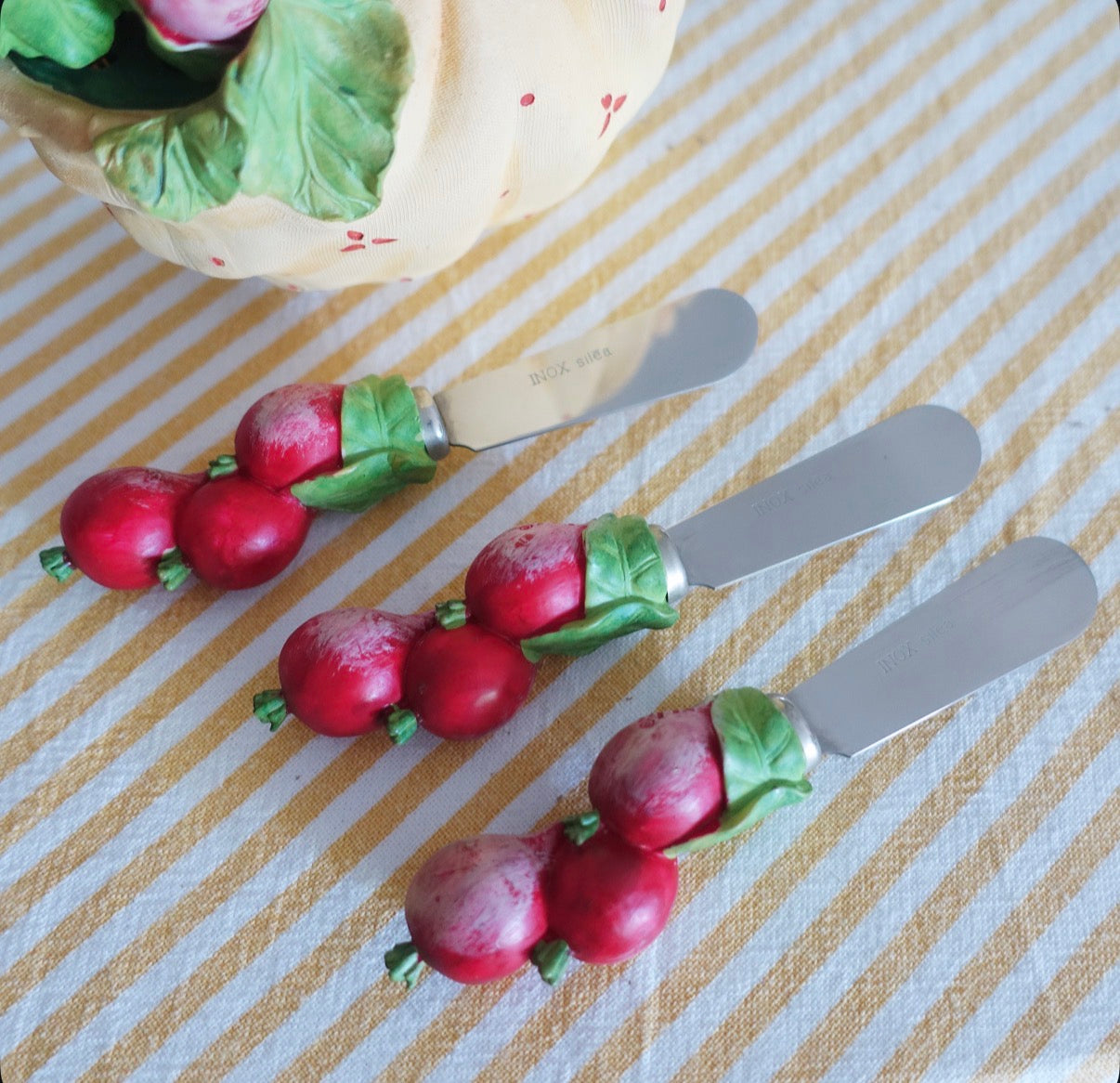 Set of six radish butter spreaders