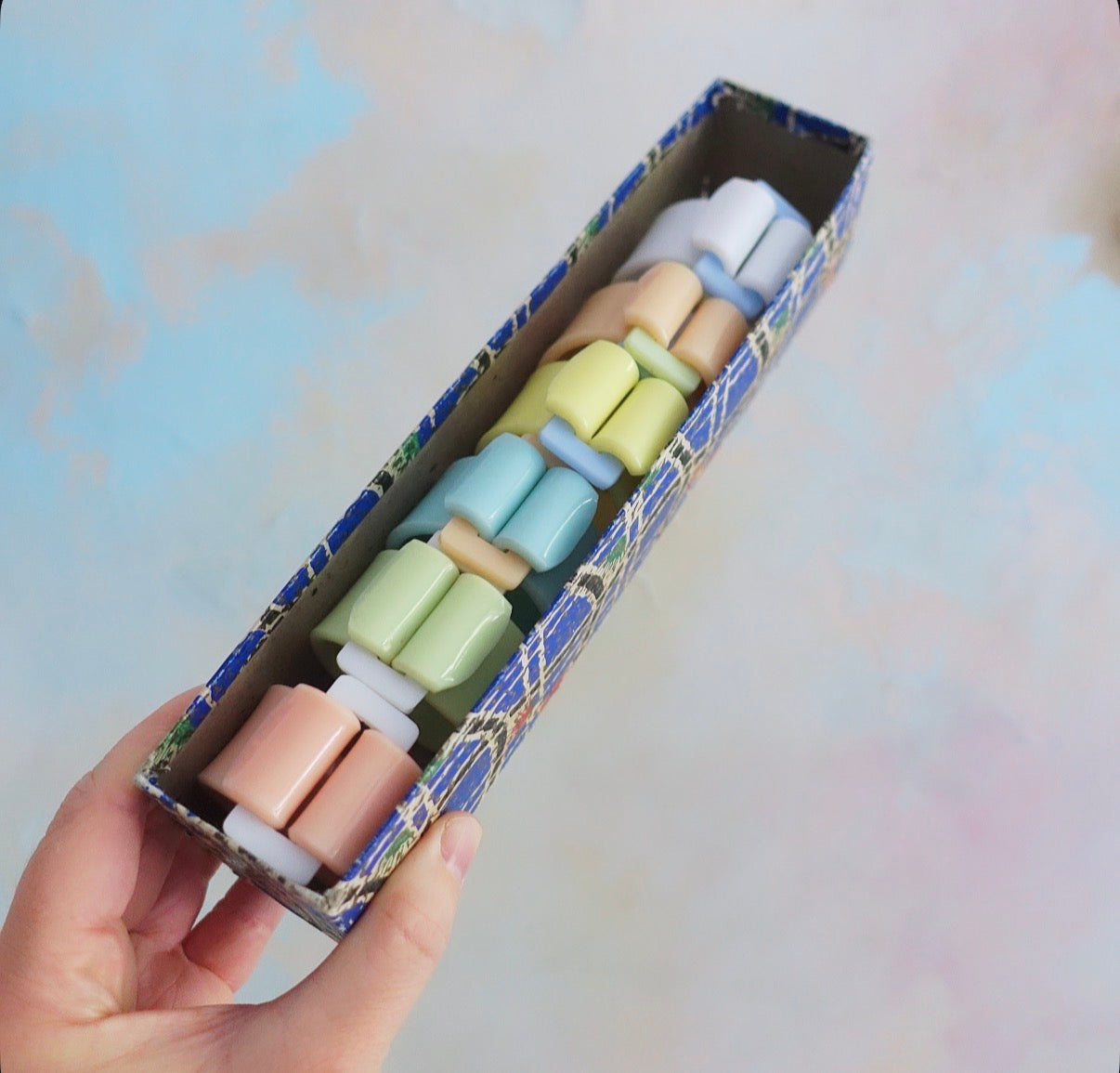 Set of six Pastel Bakelite buckle napkin rings