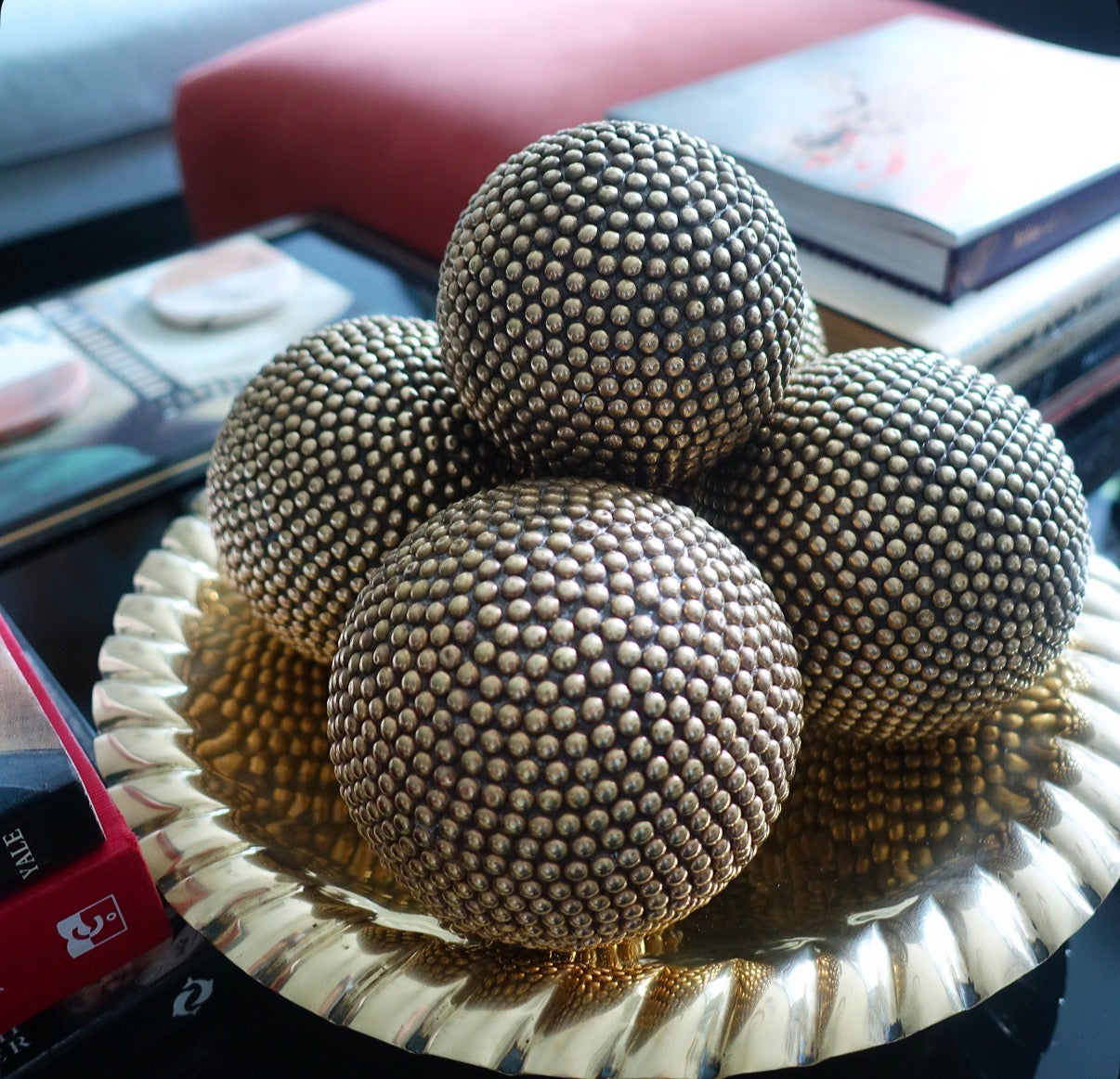 Set of five decorative brass studded balls