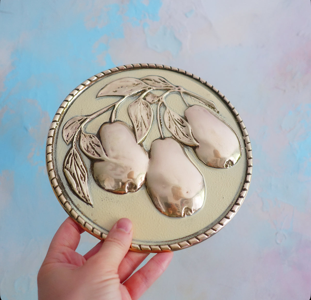 Set of four brass fruit wall plaques