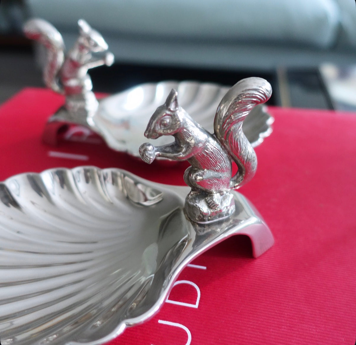 Pair of silver plated squirrel nut dishes