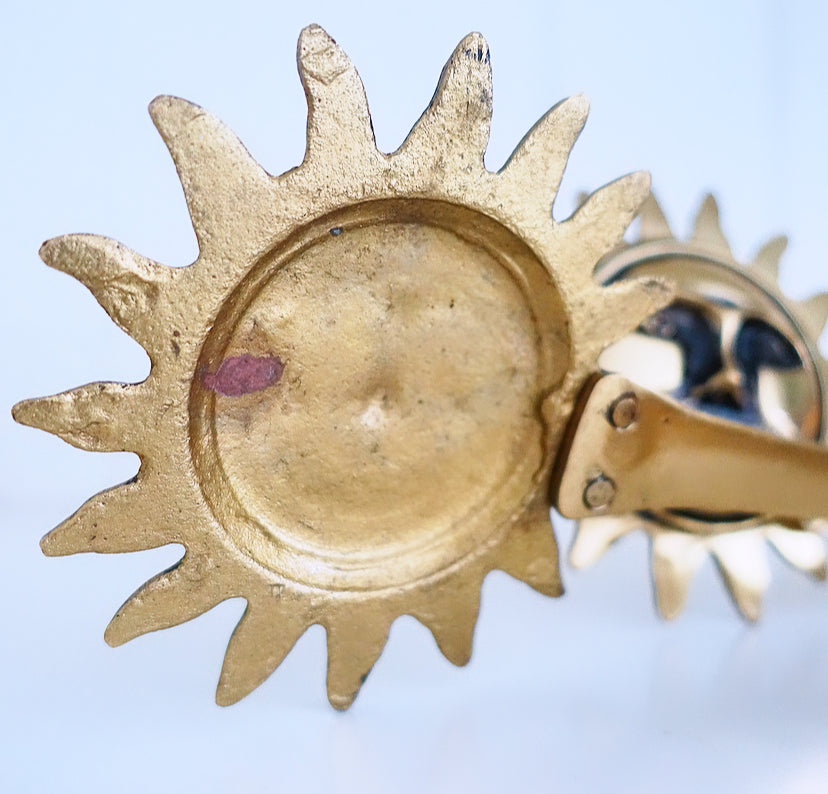 Pair of brass sun curtain tie-backs