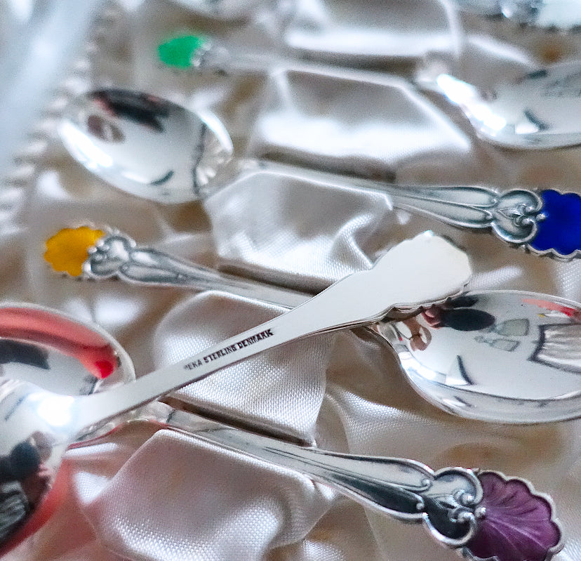 Cased set of six Danish Sterling silver & enamel shell spoons