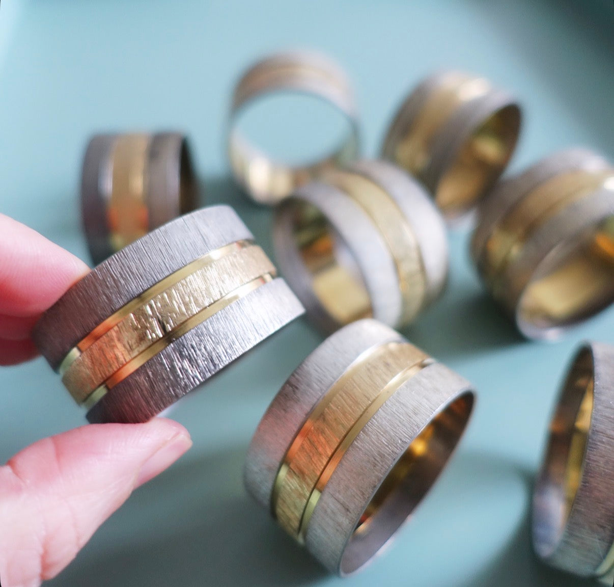 Silver & gold tone napkin rings