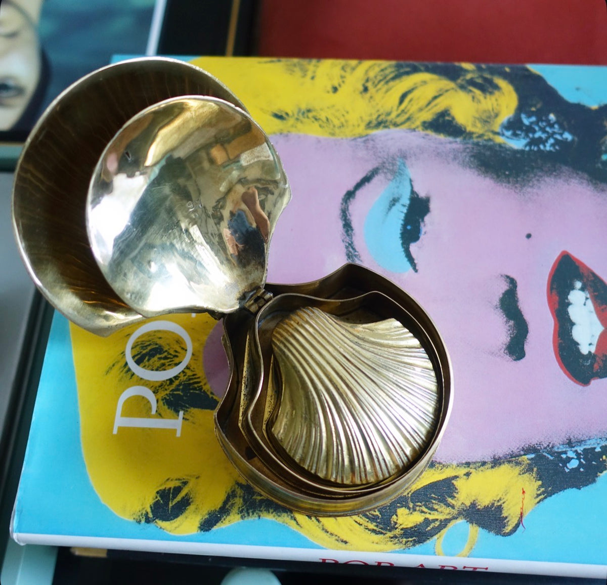 Set of three brass scallop shell trinket boxes