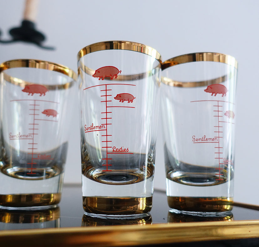 Set of four large novelty shot glasses