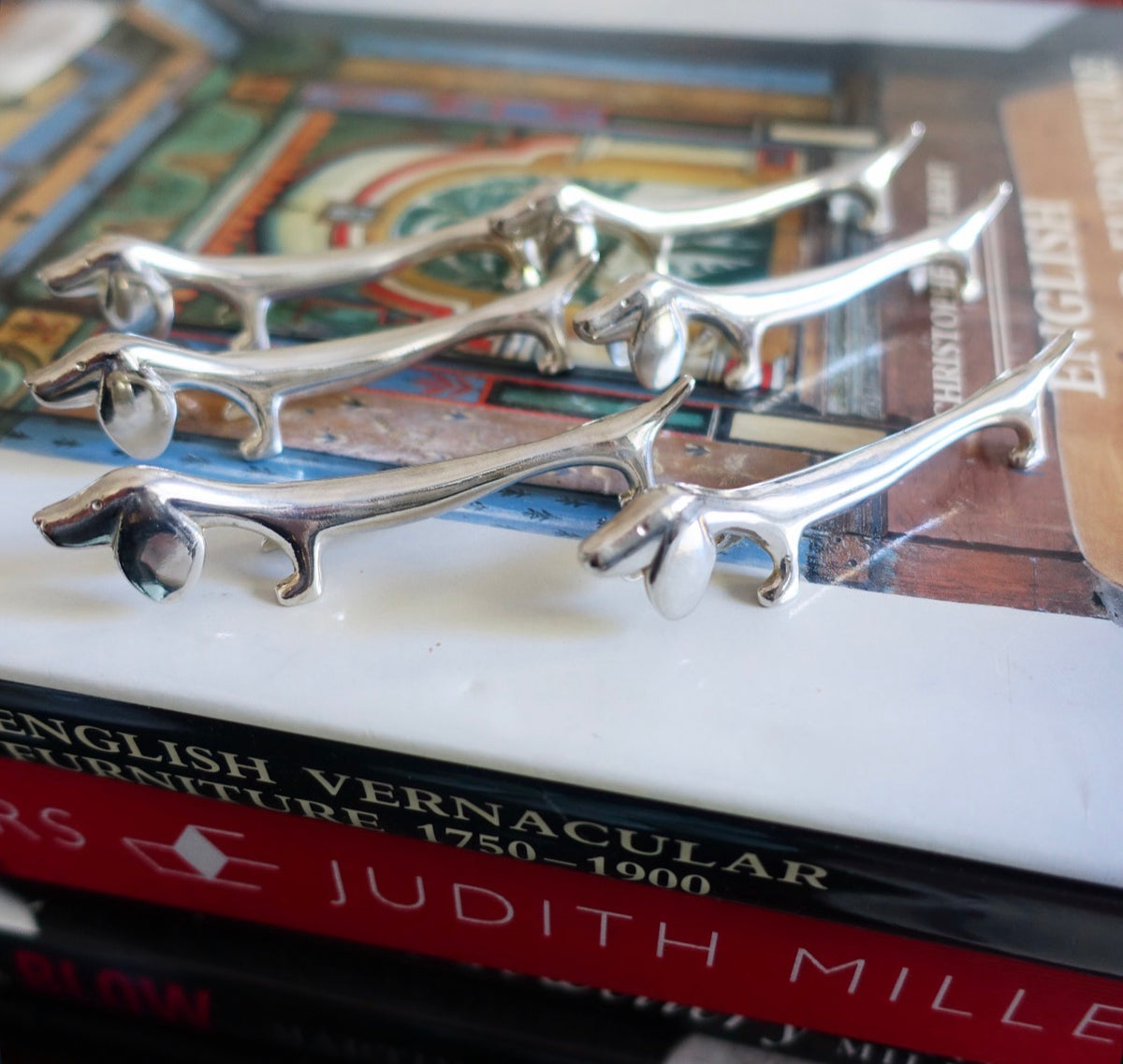 Set of six Dachshund cutlery rests