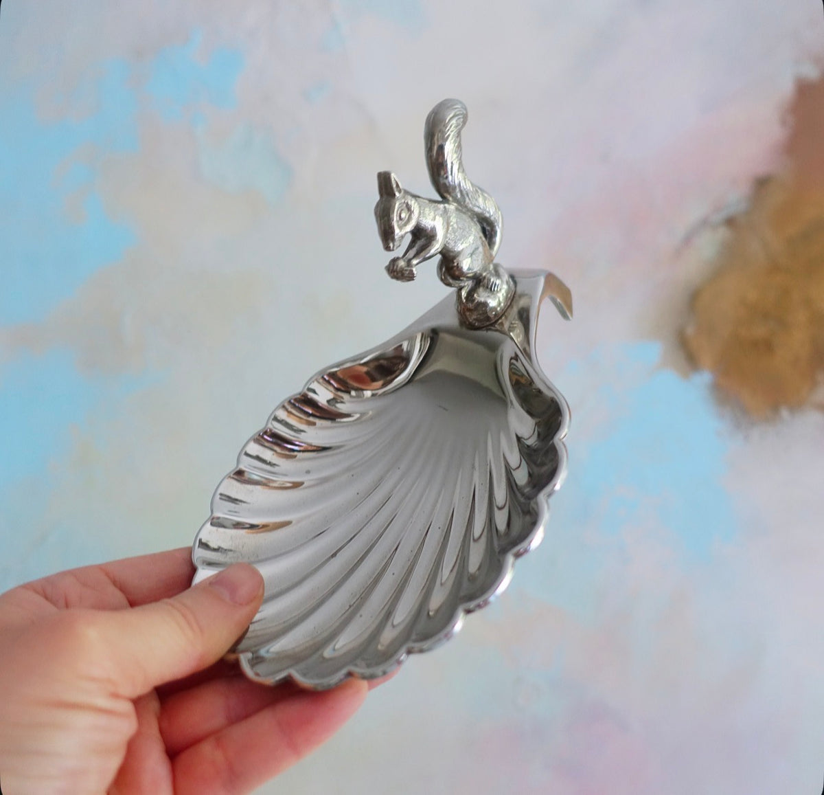 Pair of silver plated squirrel nut dishes