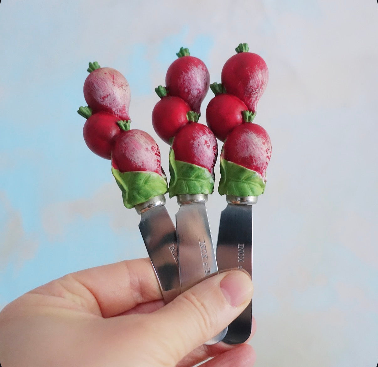 Set of six radish butter spreaders