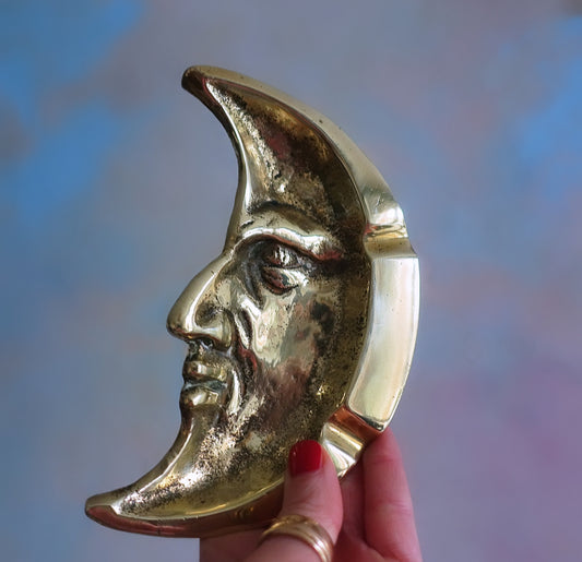 Brass man in the moon dish