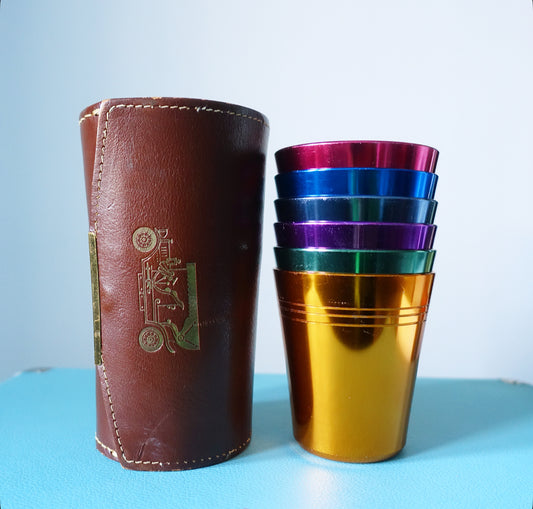 Set of six travel cups in leather case