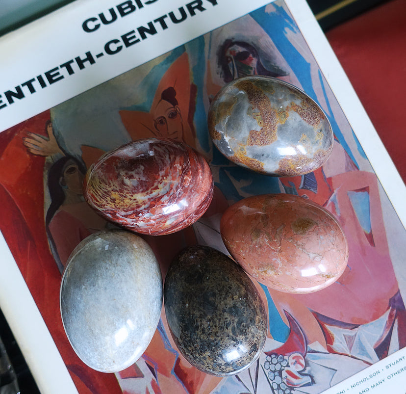 Set of five large stone eggs