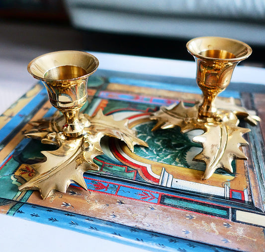 Pair of small brass Holly leaf candle holders