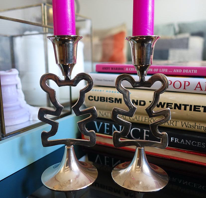 Pair of brass teddy bear candlesticks