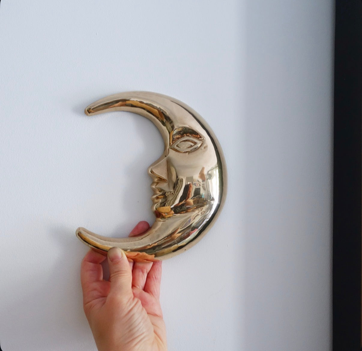 Brass sun & moon wall plaque set