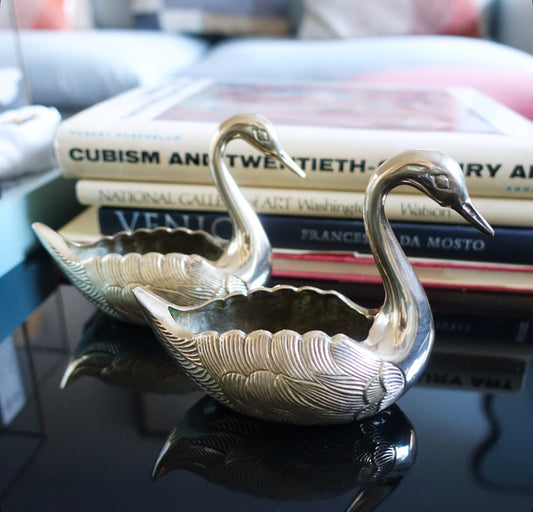 Pair of small brass swans