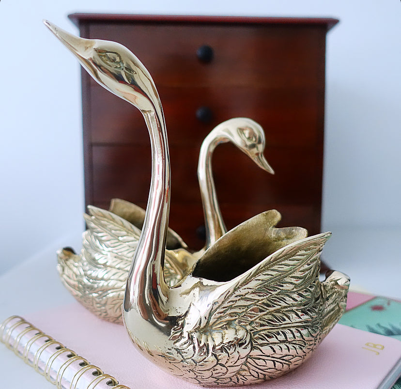 Pair of brass swans