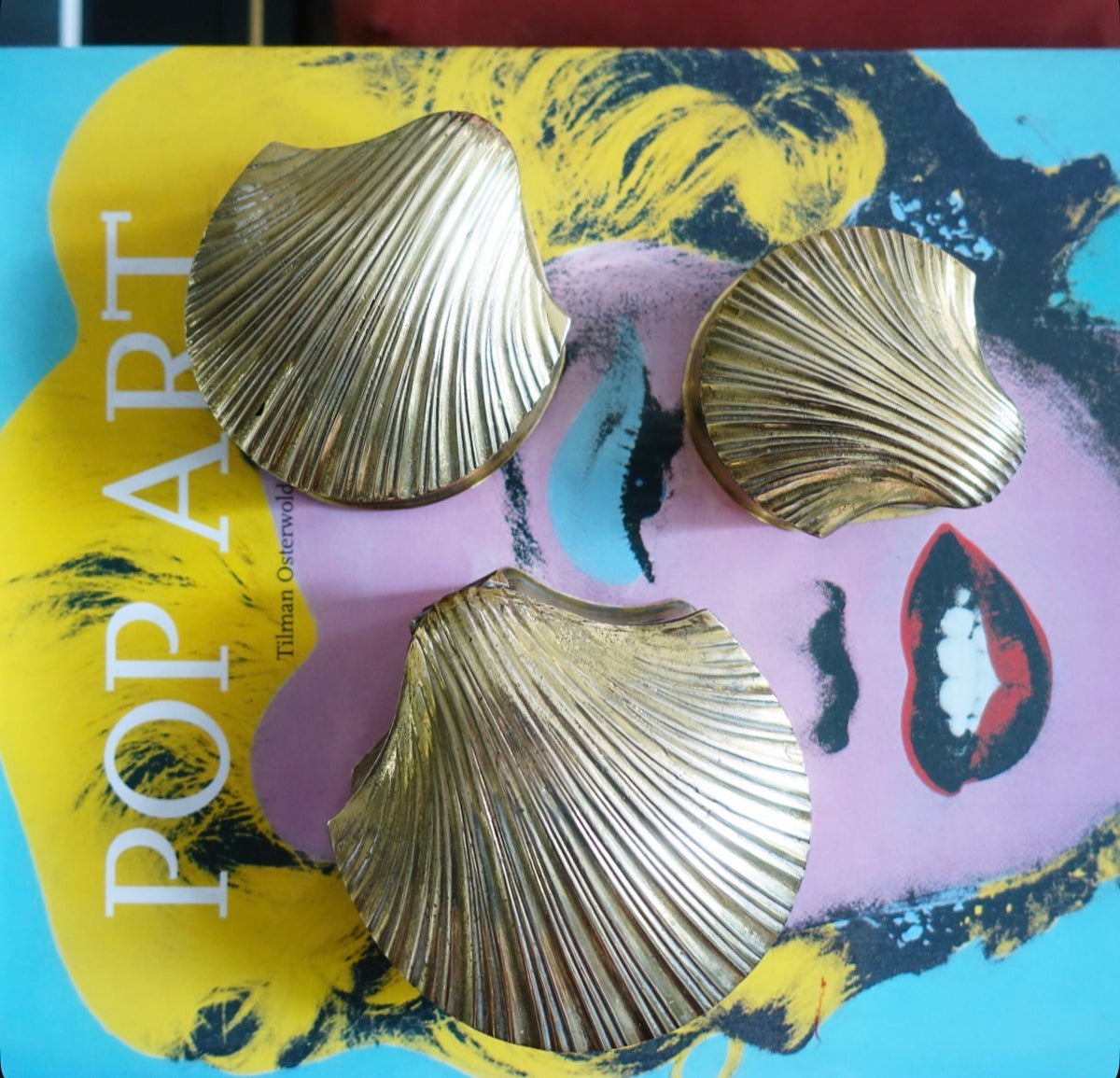 Set of three brass scallop shell trinket boxes